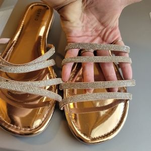 Torrid rose gold slide on sandal. Rhinestones on straps. Size 11.5 New